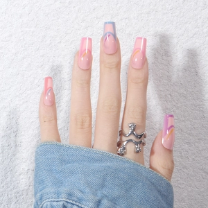 Rainbow wavy line press-on nails in nude pink with a glossy medium coffin shape finish