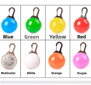 Detail view of round LED dog collar safety lights in eight vibrant color variations