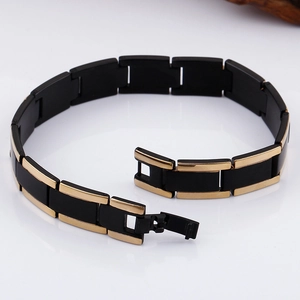 Minimalist black and gold stainless steel link bracelet for men with open clasp detail