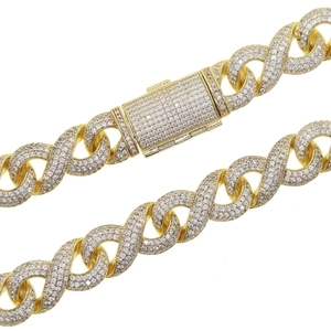 Detail of 15mm gold Cuban link chain necklace with premium zircon iced out craftsmanship