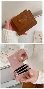 Detail showing macaron color heart-stitched PU leather wallet with multiple card slots