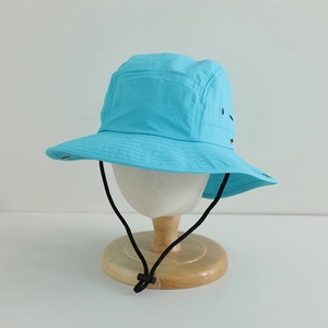 Detail of sky blue quick-dry sun hat with adjustable windproof drawstring and air vents