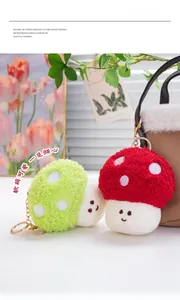 Detail of cute plush mushroom keychain with smiling face and soft Sherpa fleece texture