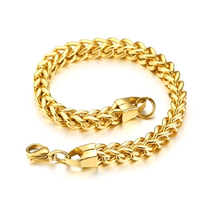 Polished gold Franco chain bracelet with a secure lobster clasp on a reflective surface