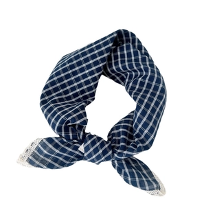 Blue and white plaid cotton linen scarf with elegant white lace trim on white background