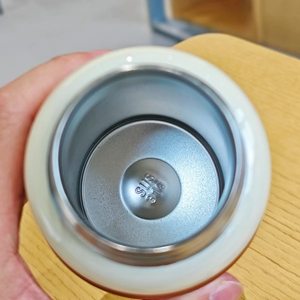 Macro shot of SUS 316 medical grade stainless steel interior on vacuum insulated cup