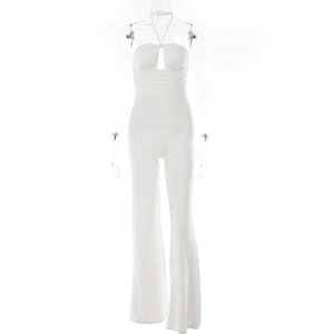 Detailed front view of white halter jumpsuit featuring chest cutout and pleated waistline