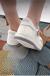 Detailed macro view of the elastic nylon loop structure on this high-traction entryway mat