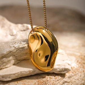 Minimalist 18k gold stainless steel necklace with hammered irregular pebble pendant