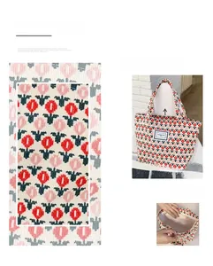 Detail of corduroy tote bag showing tulip patterns and white canvas lining interior