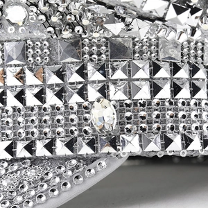 Close-up of sparkling silver sequins and metal studs on a luxury bridal party hat