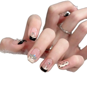 Classic black French manicure press-on nails with pink glitter and rhinestone accents