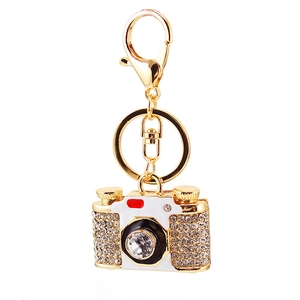 Sparkling camera shaped keychain with crystal rhinestones and golden metal hardware