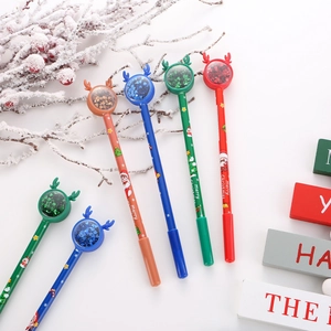Detail view of colorful Christmas reindeer pens with shimmering glitter sequins