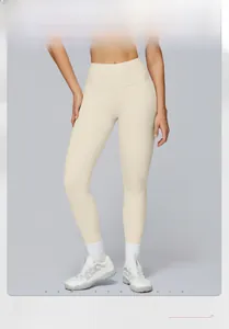 Detail of high-waist yoga leggings featuring tummy control and nude-feel fabric