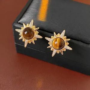 Vintage golden starburst earrings with tiger eye stone and zircon crystals for women