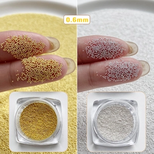0,6 mm goldene und silberne Mini-Metallperlen für professionelles DIY-Nageldesign und Dekor