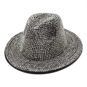 Detailed close-up of handmade silver rhinestones on a black wool Fedora jazz hat