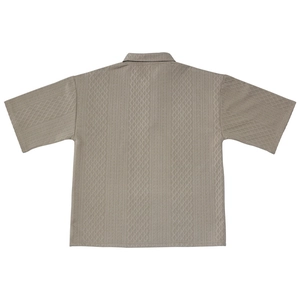 Detailed back view of a men's heavy jacquard knit shirt with geometric textures