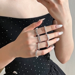 Close-up of S925 sterling silver heart and geometric rings set with sparkling zircons