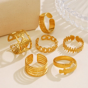 Set of 6 gold plated geometric open rings with textured hammered and chain designs