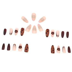 Almond-shaped press-on nails with leopard print, brown flowers and french tip designs