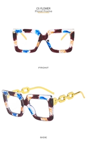 Detailed view of floral square frame glasses with gold chain metal temples