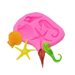 Pink silicone mold with seahorse and starfish shapes for DIY fondant and clay crafts