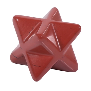 Macro shot of red crystal Merkaba star with natural black veins and polished surface