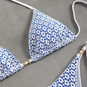 Sexy blue and white leopard lace bikini top with halter neck and pearl ring details