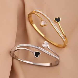 Elegant heart-shaped titanium steel bracelet with fine crystals in gold and silver finish