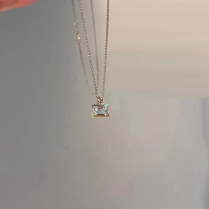 Elegant 925 silver necklace featuring a rectangular aquamarine crystal pendant on a chain