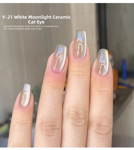 Macro detail of White Moonlight Ceramic Cat's Eye nail polish with Y-21 silver luster