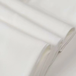 Detailed close-up of premium white twill fabric texture for elegant two-piece suit set