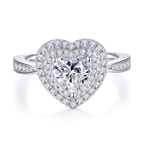 Elegant silver heart-shaped moissanite ring with halo diamonds and micro-pave setting