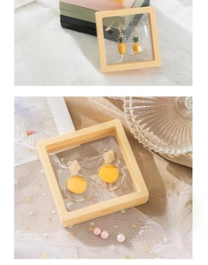 Detail of square jewelry box with buckle design and high-transparency PE film