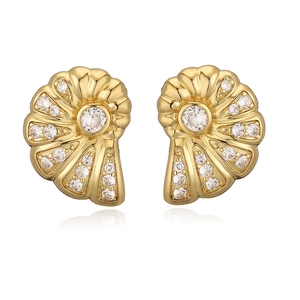 Macro detail of 18K gold plated seashell earrings with sparkling white crystals