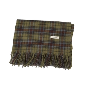 Vintage green and brown plaid scarf with tassels and vegetable label on white background