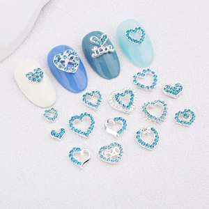 Blue heart nail charms set with silver alloy metal and sparkling rhinestones for manicure