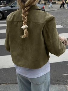 Back view of women's olive green suede jacket featuring drop shoulder and stitched seams