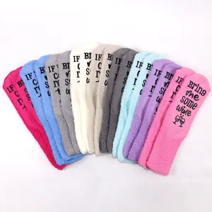 Thick coral fleece thermal socks with non-slip letter prints in various vibrant colors
