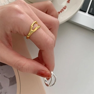Minimalist irregular S925 sterling silver rings in gold and silver organic wave design