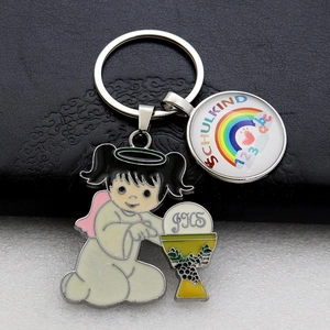 Detailed close-up of rainbow school child metal keychain with angel girl and JHS engraving