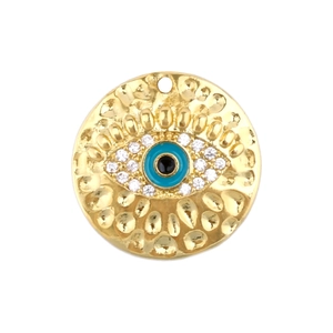 Detail of gold evil eye pendant with blue zircon iris and hammered texture finish