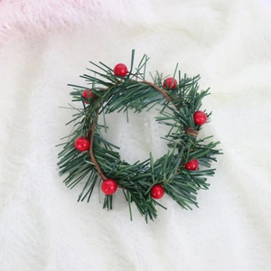 Artificial Christmas holly berry candle ring wreath with green needles for holiday decor