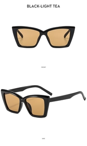 Detalle de gafas de sol cat-eye negras con lentes color té claro desde el frente y el lado