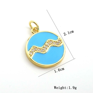 Detail shot of sky blue enamel pendant with gold trim and crystal inlay dimensions