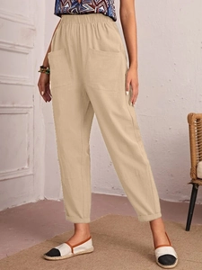 Beige cotton linen trousers for women with elastic high waist and large side pockets