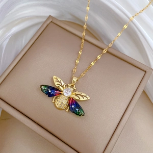 Luxurious gold bee pendant necklace with colorful gradient wings and zircon crystals