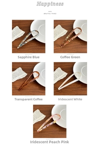 Close-up of minimalist acetate U-shaped hair pins in five elegant assorted colors